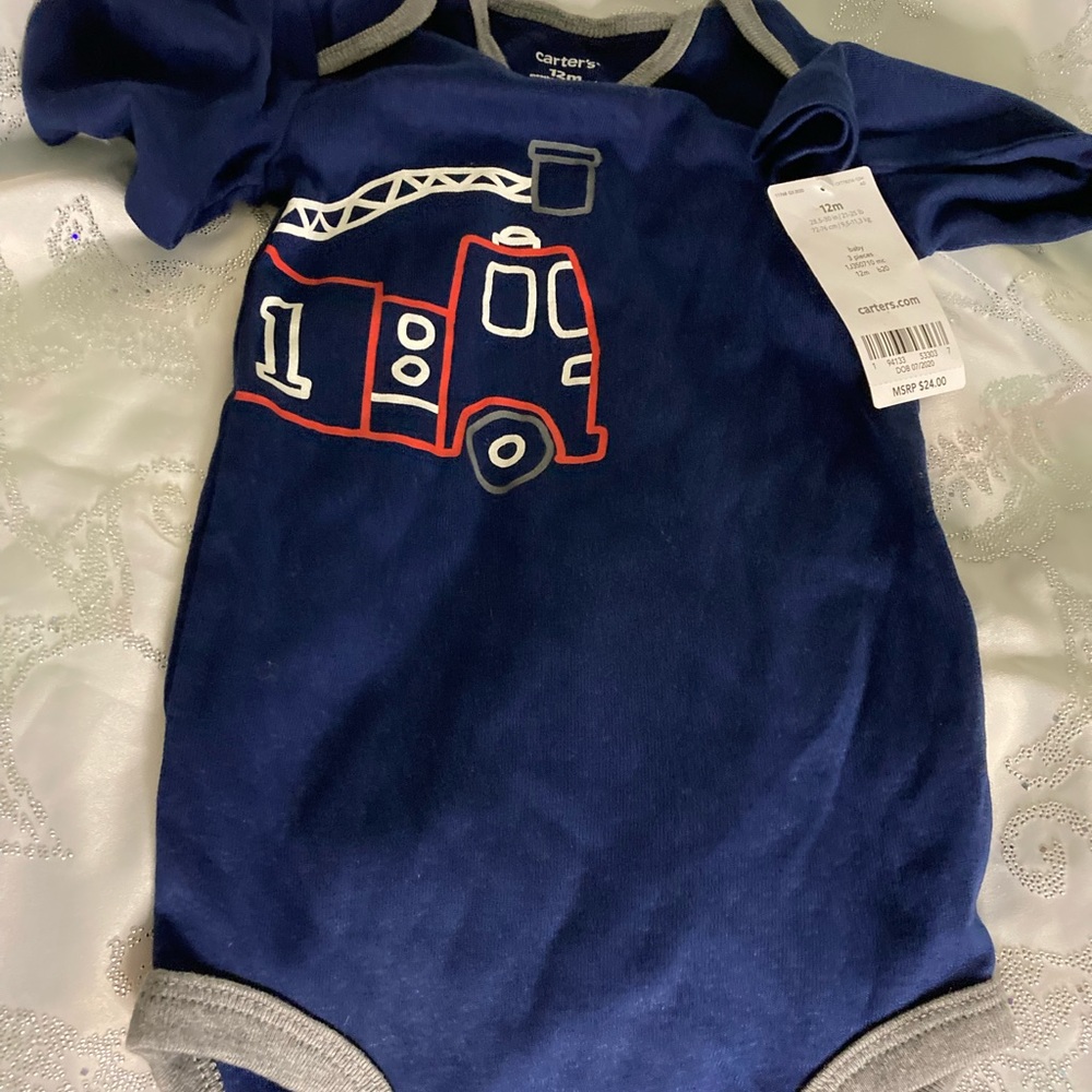 Carter’s boys long sleeve onsie size 12 month.